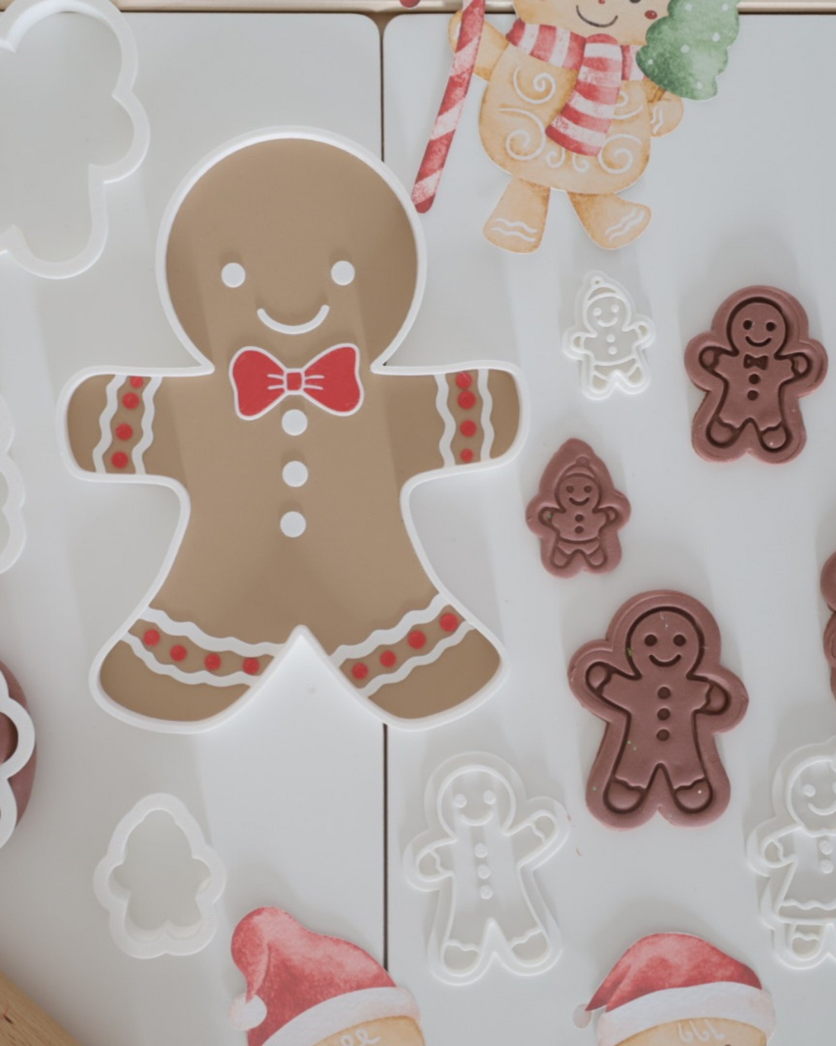 Montessori gingerbread sensory tray with 3D printed cutters and play accessories – perfect for creative holiday baking-inspired learning.