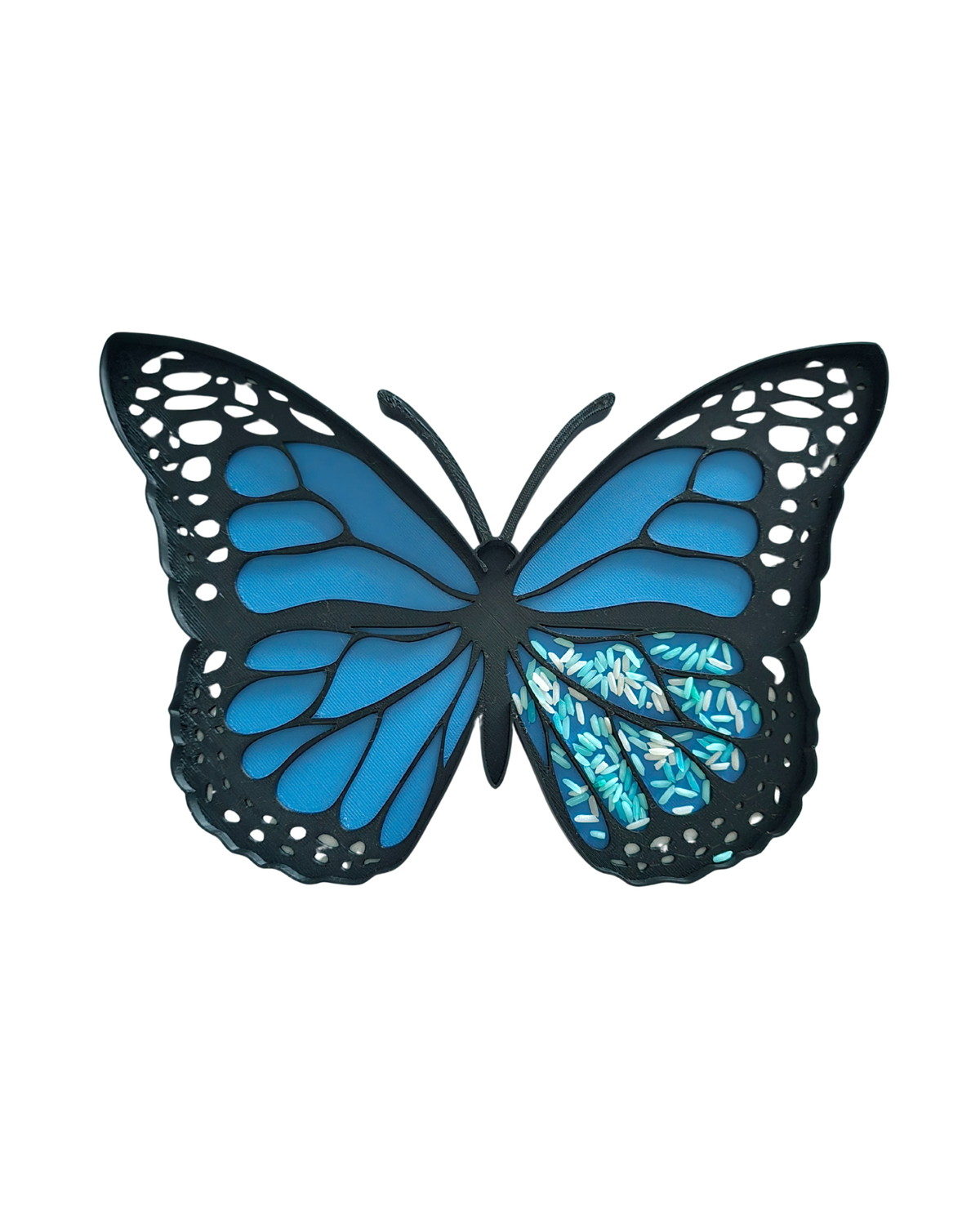 Blue butterfly sensory tray close-up, 3D printed PLA tray with wing compartments for loose parts play, Montessori sensory activity