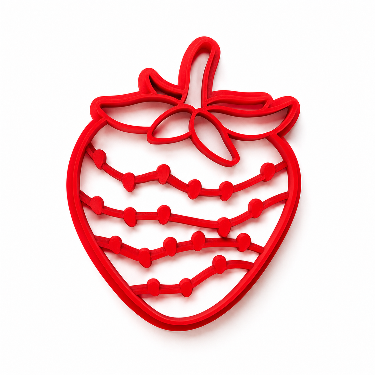 Red strawberry-shaped cutter on a white background