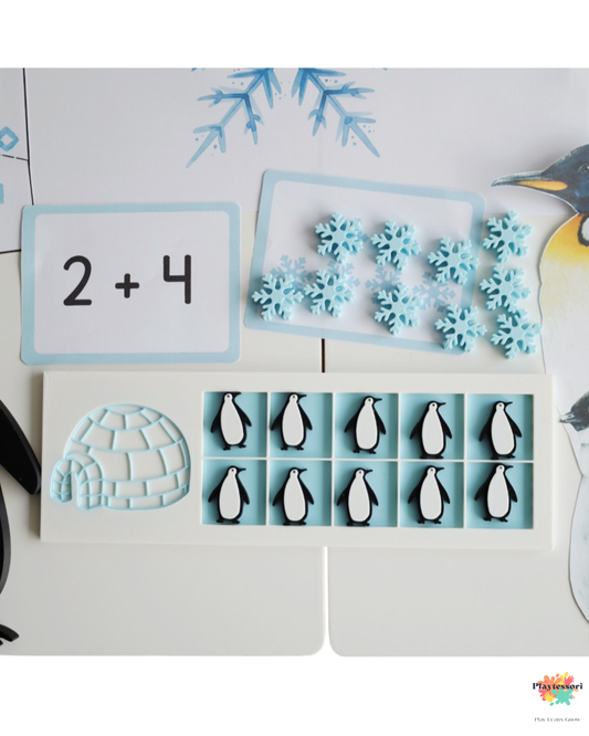Tabliczka do liczenia 10 Frame Igloo Playtessori z liczmanami pingwinami i sniezynek, pokazana wraz z zimowymi kartami matematycznymi i ilustracjami do pracy sensorycznej.