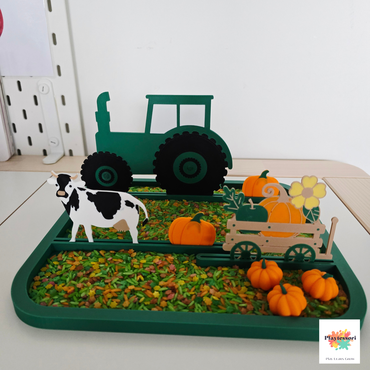 Harvest-themed farm sensory tray set with pumpkins used for sensory bins and small world play.