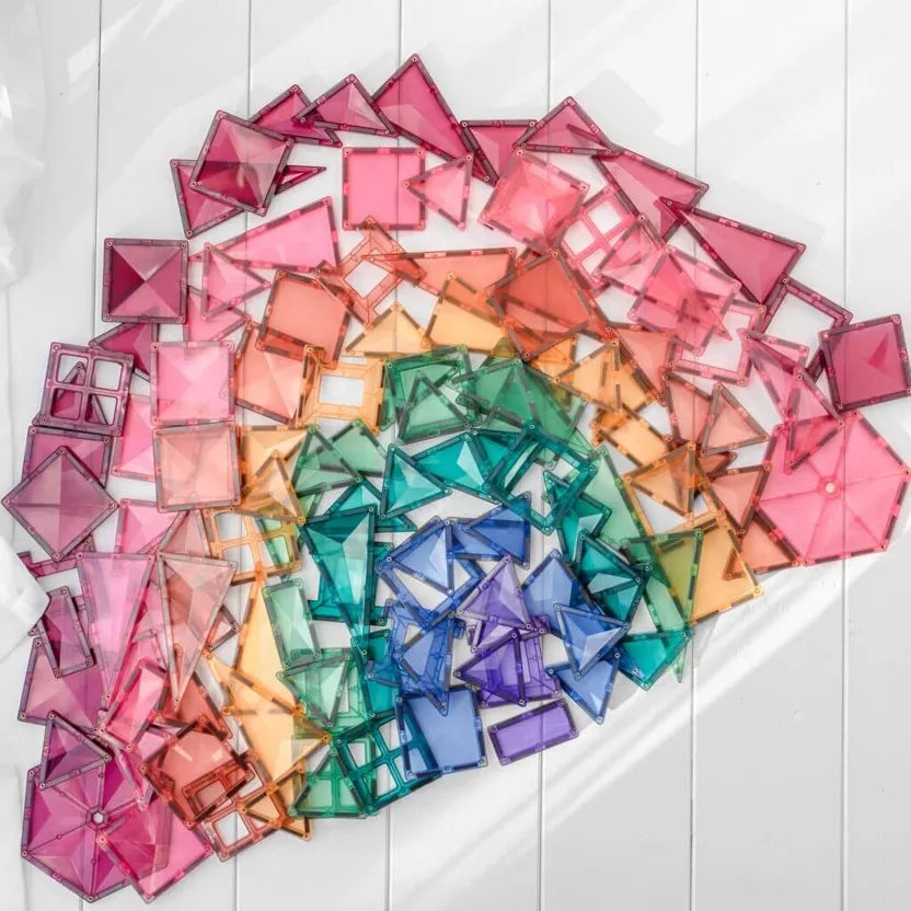 Colorful crystal-like objects arranged in a circular pattern on a white background