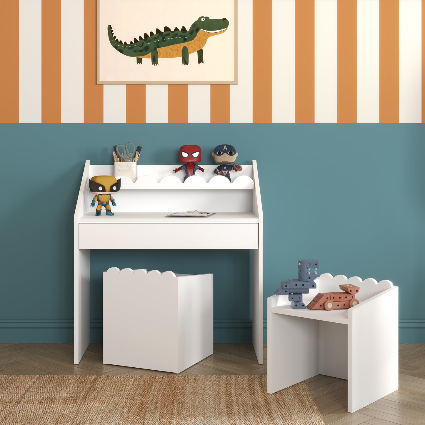 White Montessori children’s desk with matching chair in a modern kids room with teal wall and striped wallpaper, styled with toys and wall art.