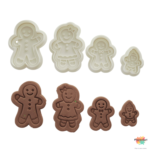 Close-up of gingerbread boy and girl cutters with stamped playdough shapes – perfect for Christmas sensory and fine-motor activities.