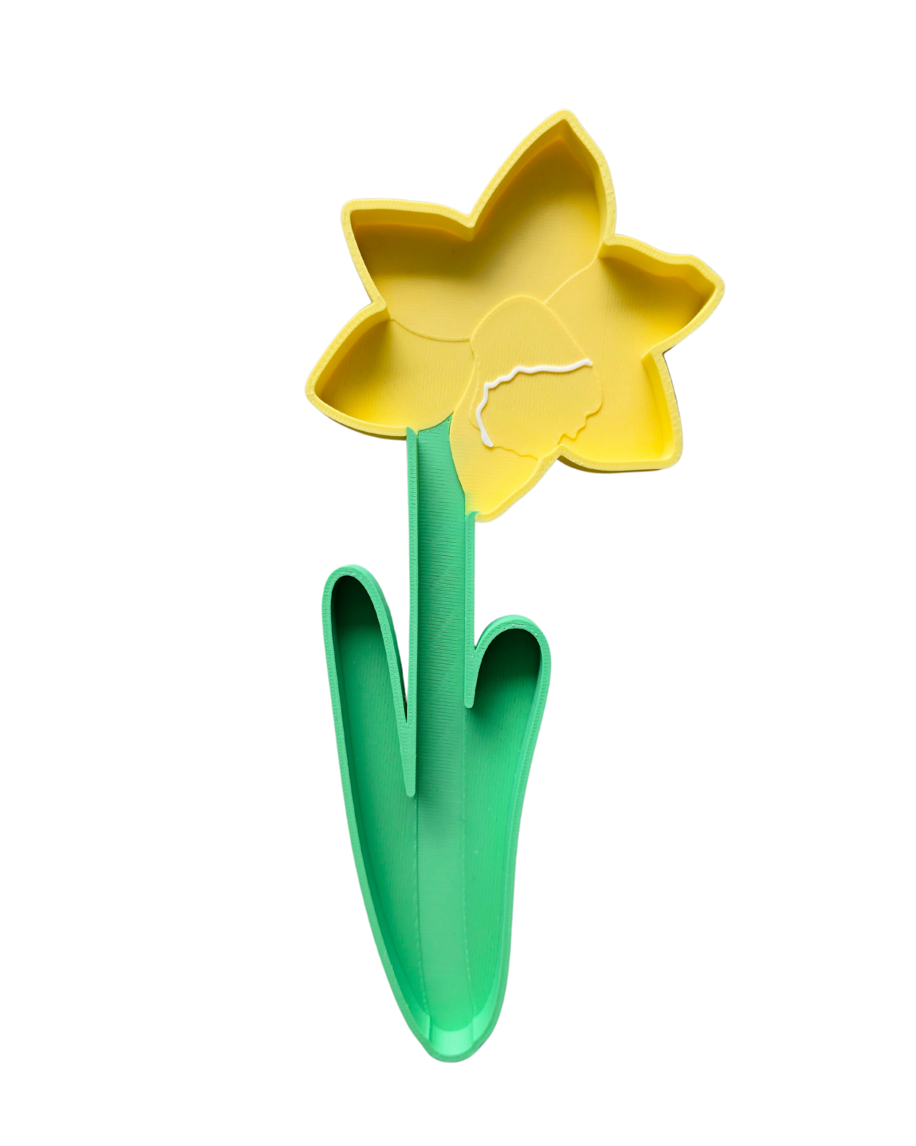 Yellow daffodil sensory play tray with raised trumpet centre, outer petals and bright green stem with curved leaves, 15cm tall, 3D printed from eco bio-PLA — Playtessori Montessori spring garden sensory tray for toddlers