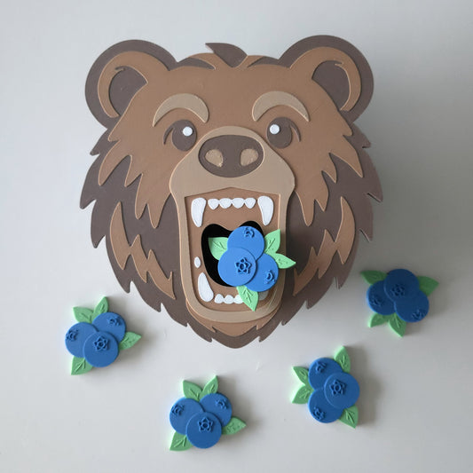 3D printed bear head with open mouth and blueberry counters