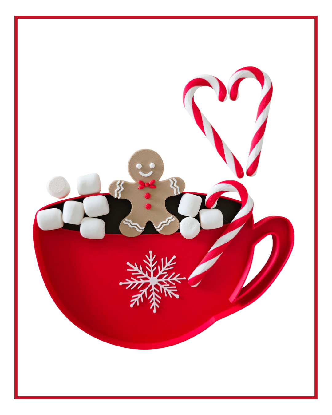 Printed hot chocolate cup tray filled with marshmallows, a gingerbread man and a candy cane heart