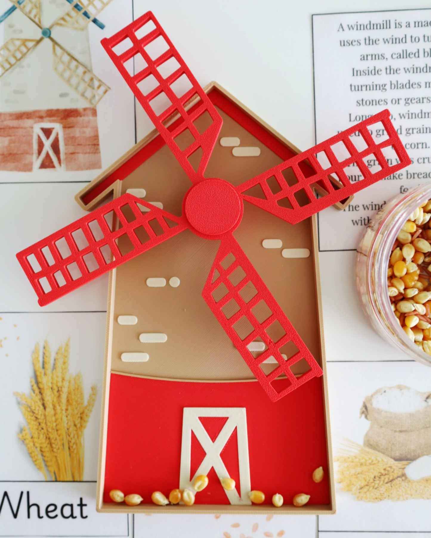 Farm windmill sensory tray with spinning blades used for sensory play and early learning.