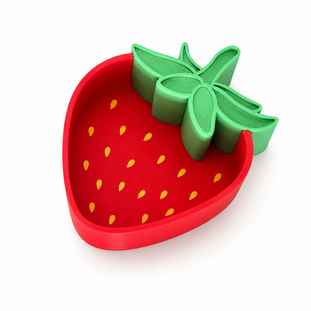 Strawberry-shaped red sensory play bowl with green stem on a white background