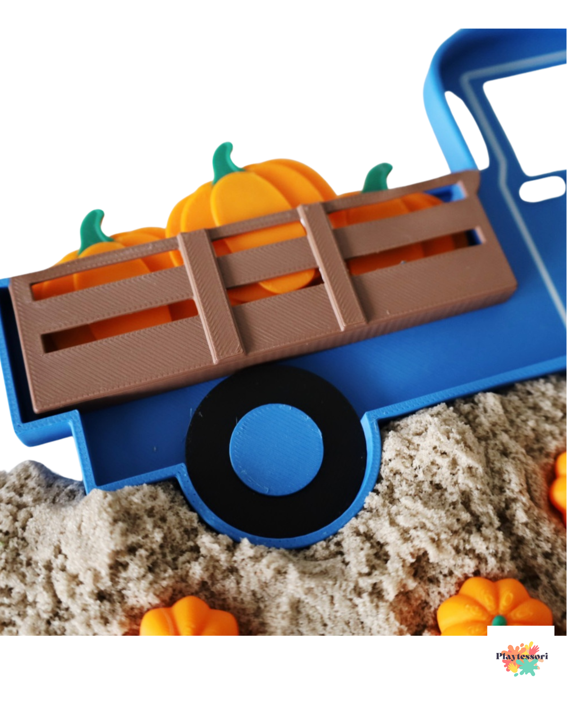 Close-up of vintage truck sensory tray with pumpkins, showing detailed design for fine motor and sensory play.